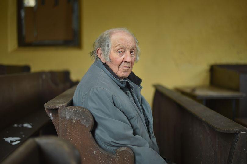 Evan Thomas is the only worshipper in his village church
