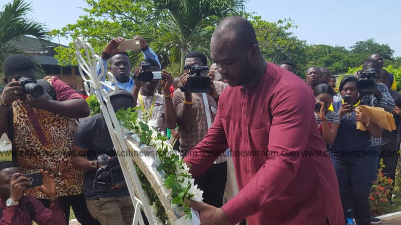 Sports Minister, Isaac Asiamah laying a wreath