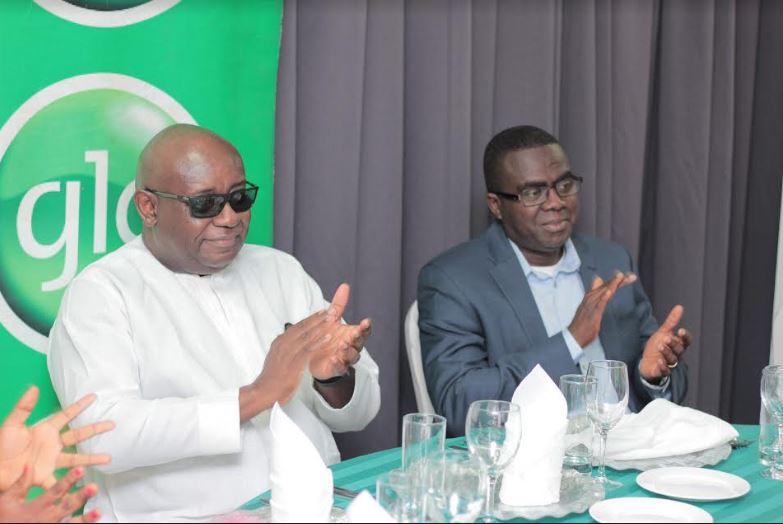 Head of Business, Glo Mobile, Mr. Uche Ojo with Head of Administration, Mr Derek Obuobi, at the Forum held in Accra for Glo Business Partners.