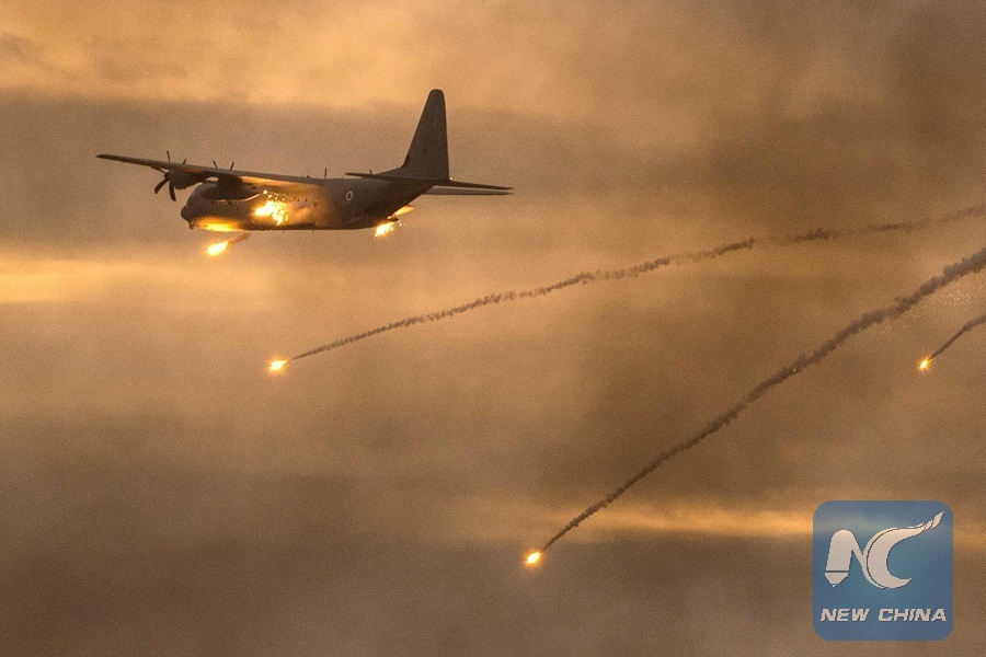 An Israeli C-130 Hercules plane launches anti-missile flares during an air show at the graduation ceremony of Israeli air force pilots at the Hatzerim Israeli Air Force base in the Negev desert, near the southern Israeli city of Beer Sheva, on December 27, 2017.