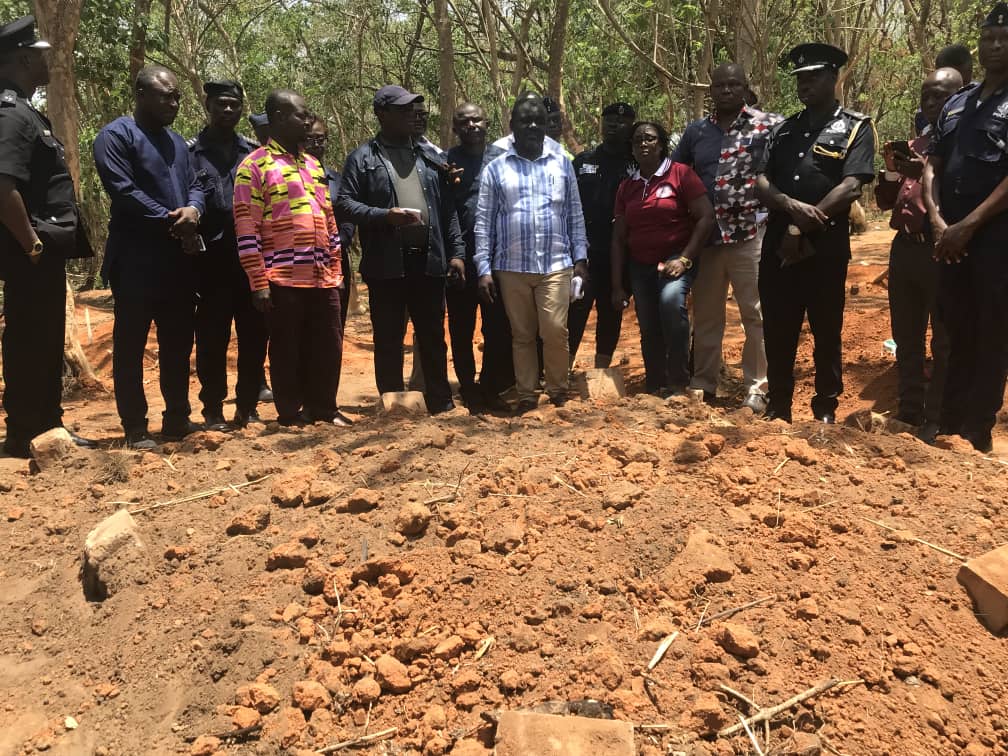 Government officials at the mass burial ground