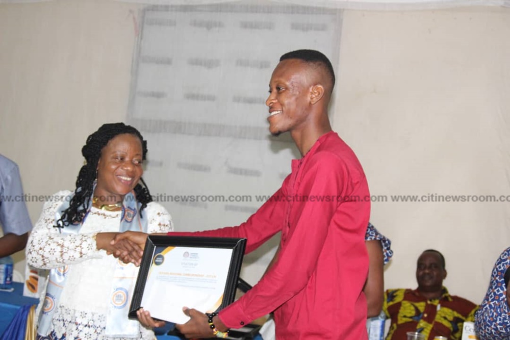 Mr. Kanarku receiving his citation from the Vice Chancellor of KTU