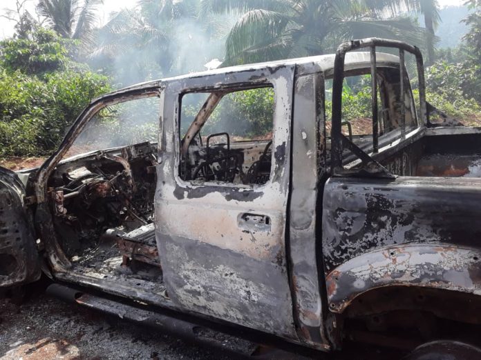 The aggrieved staff of the bauxite company set vehicles and other property of the company on fire during their protest. 