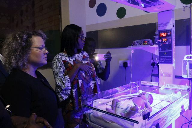 Amb. Shani Cooper with officials at the Kumasi South Hospital Neonatal Unit.