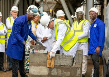 Chief Executive, David MacLennan laying a brick to commence the expansion works