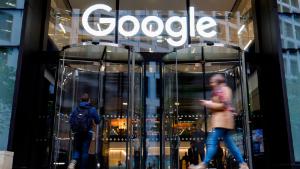 People walk past Google's UK headquarters in London on November 1, 2018. - Hundreds of employees walked out of Google's European headquarters in Dublin on Thursday as part of a global campaign over the US tech giant's handling of sexual harassment that saw similar protests in London and Singapore. (Photo by Tolga Akmen / various sources / AFP)        (Photo credit should read TOLGA AKMEN/AFP via Getty Images)
