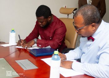 Bishop Gideon Titi-Ofei (Right) together with Jay Hyde, President of NUGS, signing the MOU