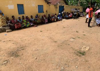 Applicants waiting side by side despite the advice to engage in social distancing