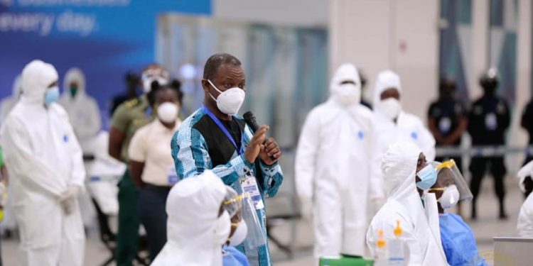 Director-General of the Ghana Health Service, Dr Patrick Kuma-Aboagye with some health professionals