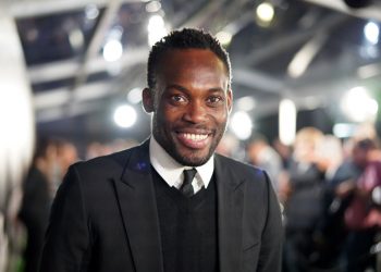 MILAN, ITALY - SEPTEMBER 23: FIFA Legend Michael Essien of Ghana arrives on the green carpet ahead of The Best FIFA Football Awards 2019 at Teatro alla Scala on September 23, 2019 in Milan, Italy. (Photo by Simon Hofmann - FIFA/FIFA via Getty Images)
