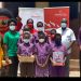 Caption: Donation of Young Ruler Magazines and sanitizers made to Ringway Basic School during Global Money Week by Prudential Life and JA Ghana