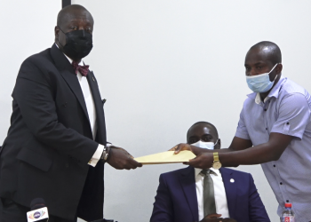 GBA President, Anthony Forson Jnr. receives the petition from Online Editor, Ebenezer Afanyi Dadzie.
