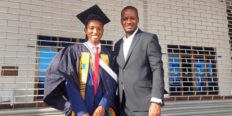 Ali Inusah with Citi FM's Umaru Sanda Amadu