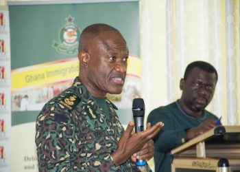 The Comptroller-General of Immigration, Mr Kwame Asuah Takyi explaining a point during the dialogue session