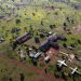 An aerial view shows six repurposed aircrafts parked at Ghanaian artist Ibrahim Mahama's studio facility, a multi-acre compound that functions as an open-door education hub, in Tamale, Ghana July 15, 2022. REUTERS/Francis Kokoroko