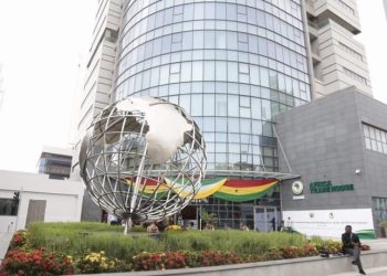 (200818) -- ACCRA, Aug. 18, 2020 (Xinhua) -- A man sits outside the African Continental Free Trade Area (AfCFTA) Secretariat office in Accra, capital of Ghana, August 17, 2020. Ghanaian President on Monday handed over the edifice housing the African Continental Free Trade Area (AfCFTA) secretariat to the African Union (AU) for the commencement of work. (Ghana Presidency/Handout via Xinhua)