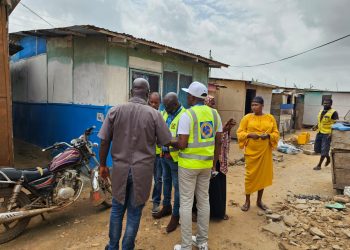 ECG officials in parts of Gbetsile, interacting with customers as part of the revenue mobikization drive
