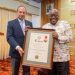 Mr Margaropolous presenting the citation to President Akufo-Addo