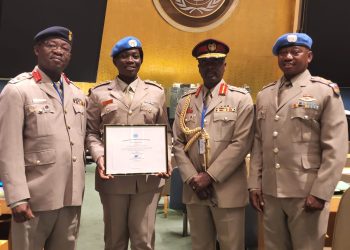 Captain Erzuah with some officials