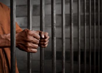 File image of a man behind bars
