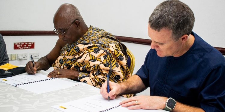 David Thornton, Regional Senior Vice President for Newmont Africa, and Nana Prof. Oheneba Boachie-Adjei Woahene II, the chairman of the Otumfuo Foundation, signing the MoU
