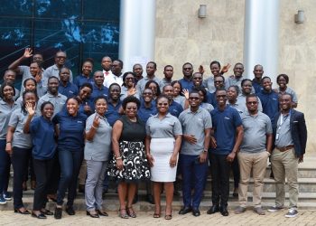 The speakers and some of the participants in a photograph after the event