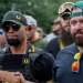 Joe Biggs (right) with Enrique Tarrio at a rally in 2019