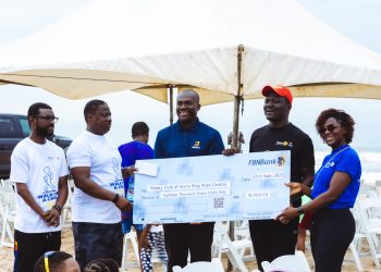 Victor Yaw Asante, FBNBank Ghana MD/CEO, second from right presenting the cheque to Kwadwo Akrofi Koram, President, Rotary Club of Accra Ring Road Central
