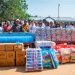 Mr Dai presenting the relief items to Mr Okudzeto Ablakwa at Mepe