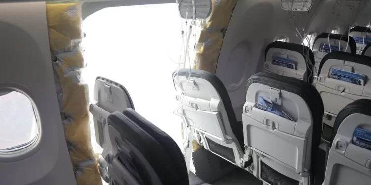 A view from inside the cabin of a plane with a section from the side of the vehicle missingIMAGE SOURCE,NATIONAL TRANSPORATION SAFETY BOARD