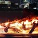 Japan Airlines Flight 516 in flames at Haneda Airport