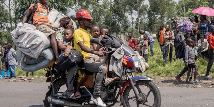 Goma's population has swelled in recent days as people arrive by motorbike and foot fleeing advancing fighters