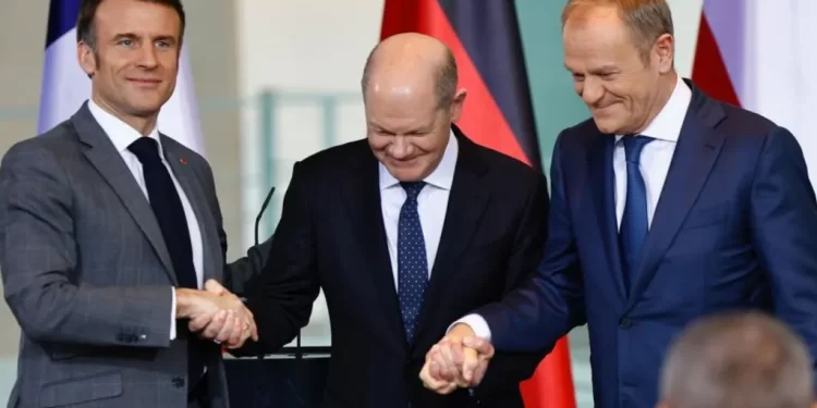 Mr Tusk (R) praised a change in mentality among European allies but said the next two years were critical