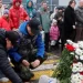 Flowers were laid at a makeshift memorial outside the concert hall on Saturday