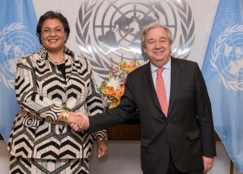 Secretary-General António Guterres (right) swears in Hannah S. Tetteh, Director-General of the United Nations Office at Nairobi.