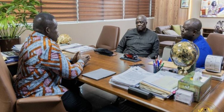 Sam George in a meeting with officials of DSTV