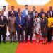Hon Iddrisu Haruna (middle), Mr Baibhav Biswas (5th left), and Dr. Eric Kofi Adzroe (4th left), are joined by the management staff of Olam Agri’s grain facility after the launch.