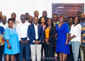 CEO of CIB Ghana, Robert Dzato, ACIB (Middle), with Fidelity Bank Staff and Journalists from the Western and Central Region after training session