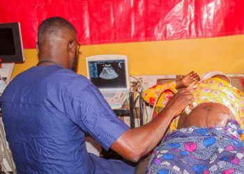 A health worker screens a pregnant woman during the Telecel Ghana Foundation’s Rural UltraSound Initiative in Kubori.