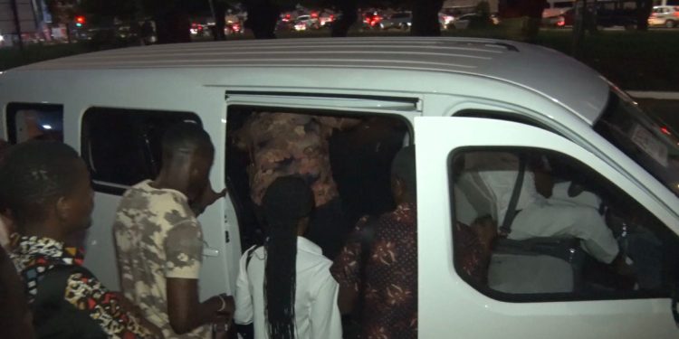 Passengers trying to board trotro
