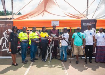 Staff of AngloGold Ashanti with some PWDs