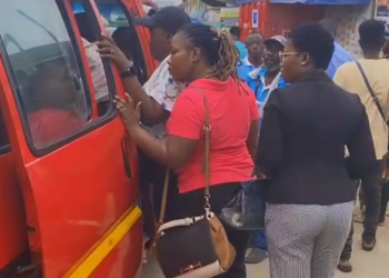 Some commuters trying to board a trotro at Lapaz-Accra station