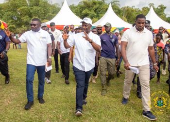 Minister for Lands and Natural Resources, Emmanuel Armah Kofi Buah, waving at the crowd