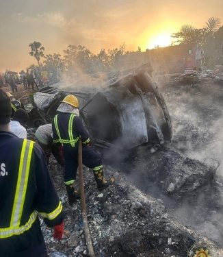 Fire service officials at the accident scene