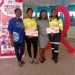 Officials of Gold Fields with teachers at Huni-Valley Senior High School.