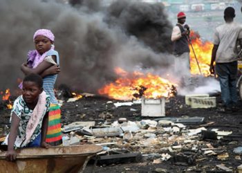 File Photo: Some children standing at a dumpsite