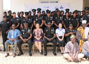 Police officers in the Northern region with JICA officials.