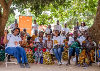Some staff of Madina Branch with residents of Gbantana, Ada, during the outreach