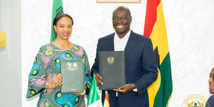 AfDB’s outgoing Country Manager in Ghana, Eyerusalem Fasika(left), Minister for Finance, Dr Cassiel Ato Forson(right)