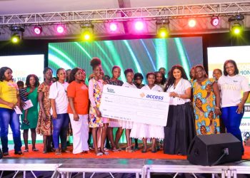 Founder of Emerge New Woman, Lady Mae, Nana Ama McBrown, actress, with some of the beneficiaries.